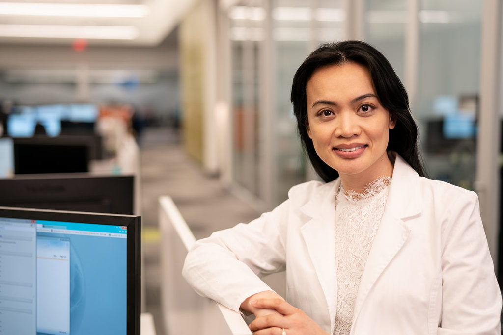 female customer service representative smiling at camera